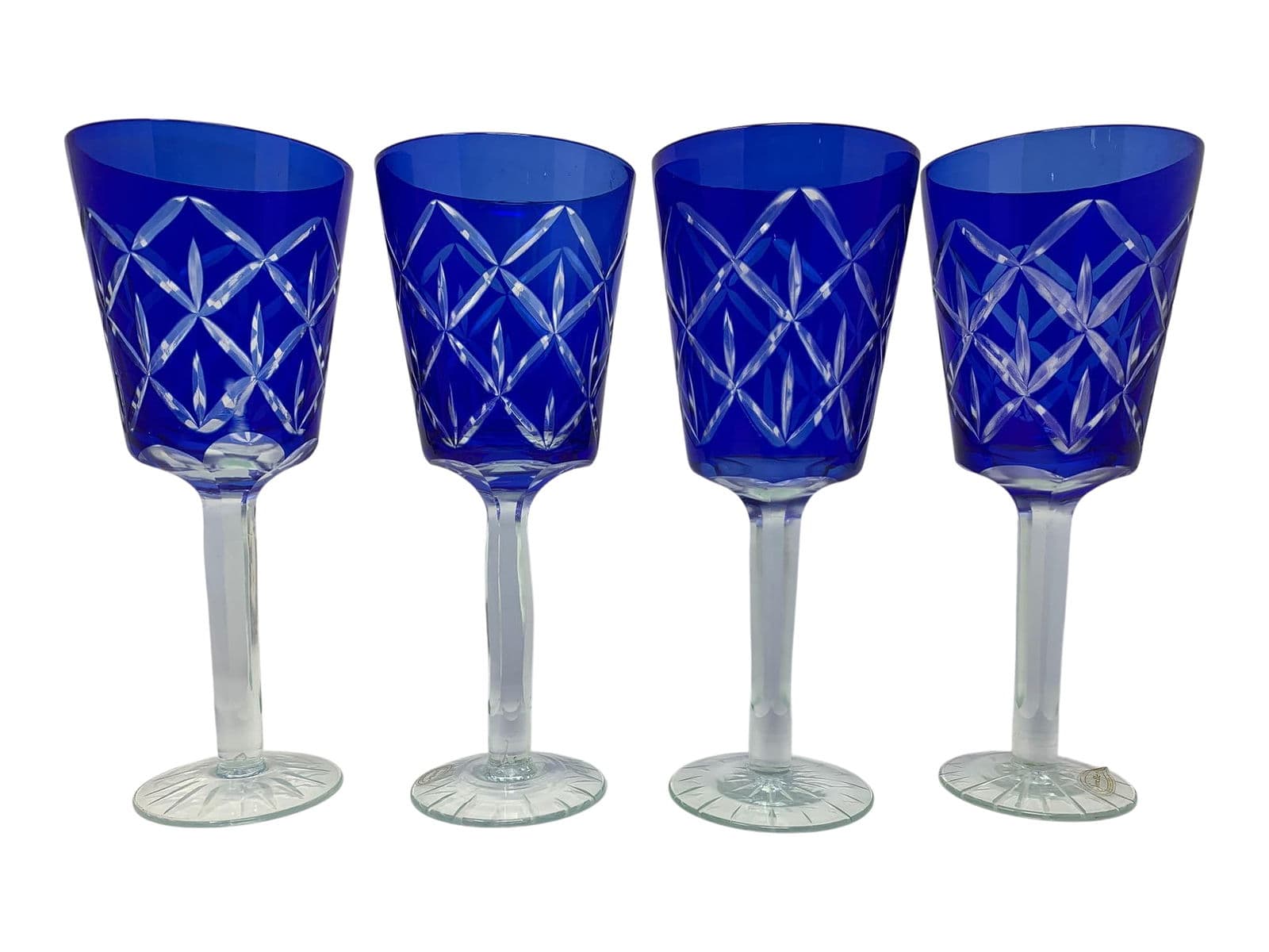 Four cobalt-blue cut-crystal goblets from a recent Prime auction catalog