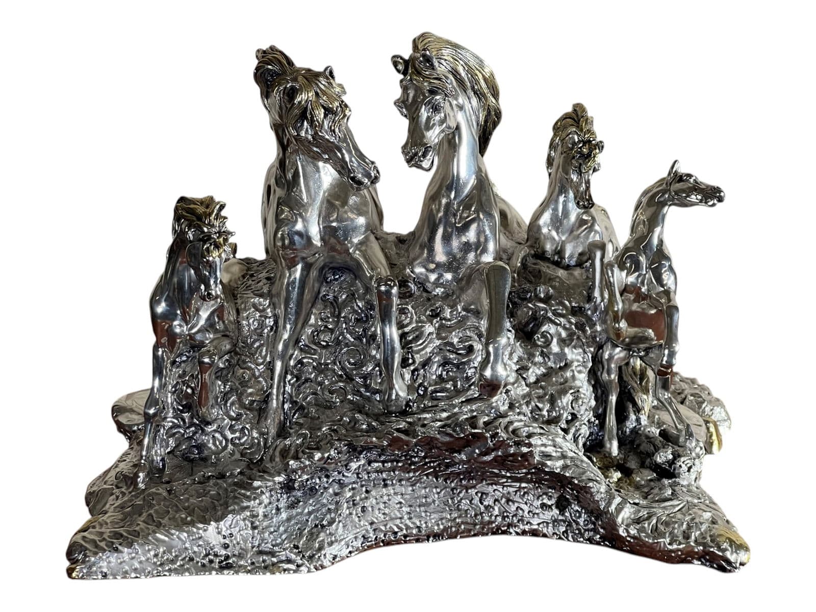 Silver-tone herd-of-horses sculpture from a recent Prime auction catalog